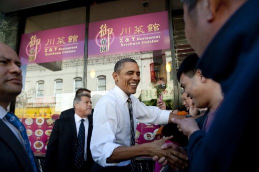 President Obama in fromt of Z and Y Restaurant